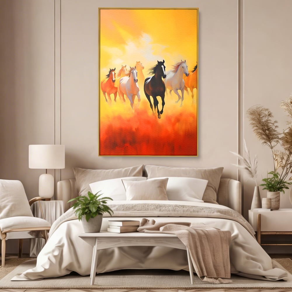 Tablou canvas cu pictura cu cai in galop, in rama de aluminiu auriu, pe perete intr-un dormitor